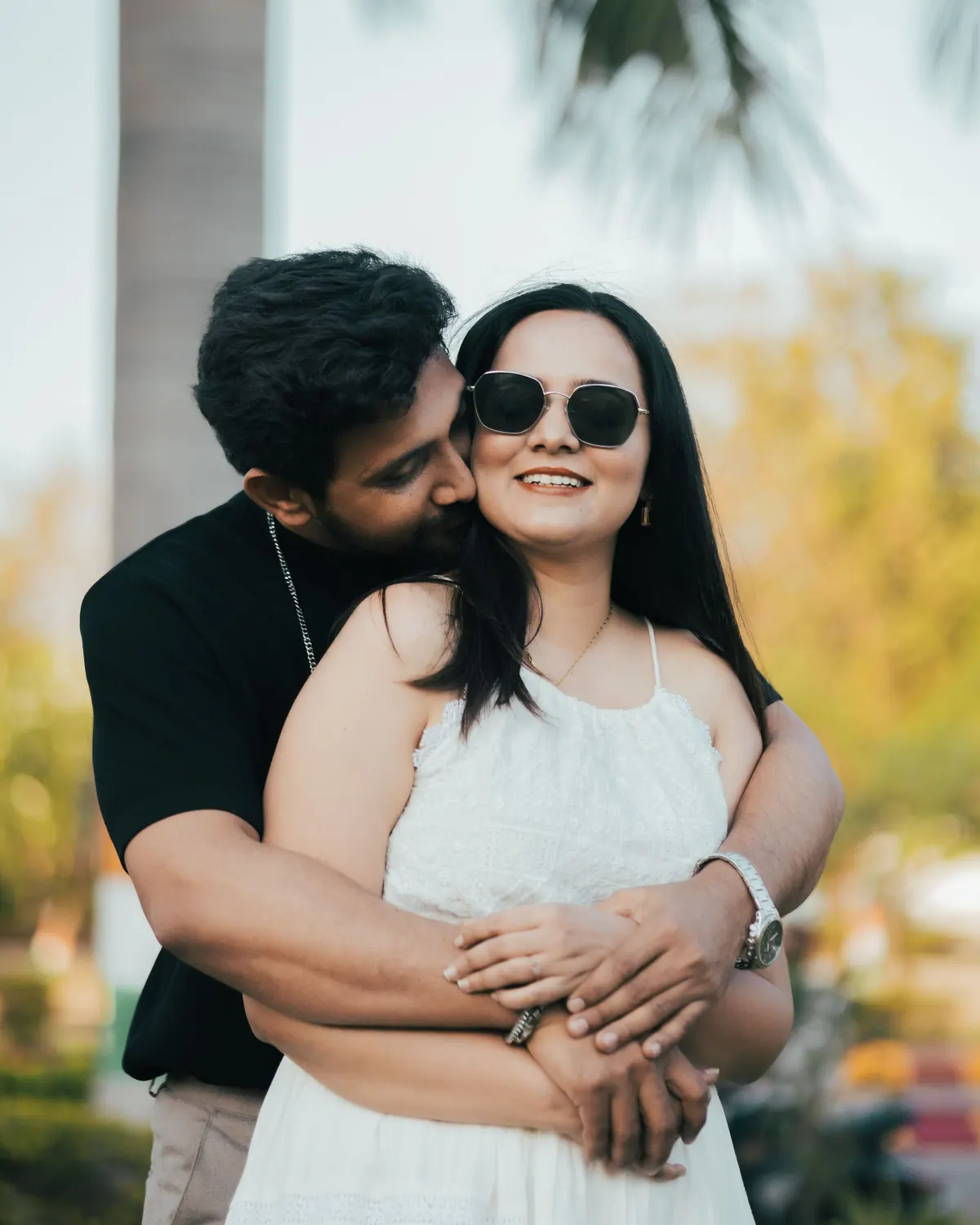 A hug from behind on a sunny afternoon