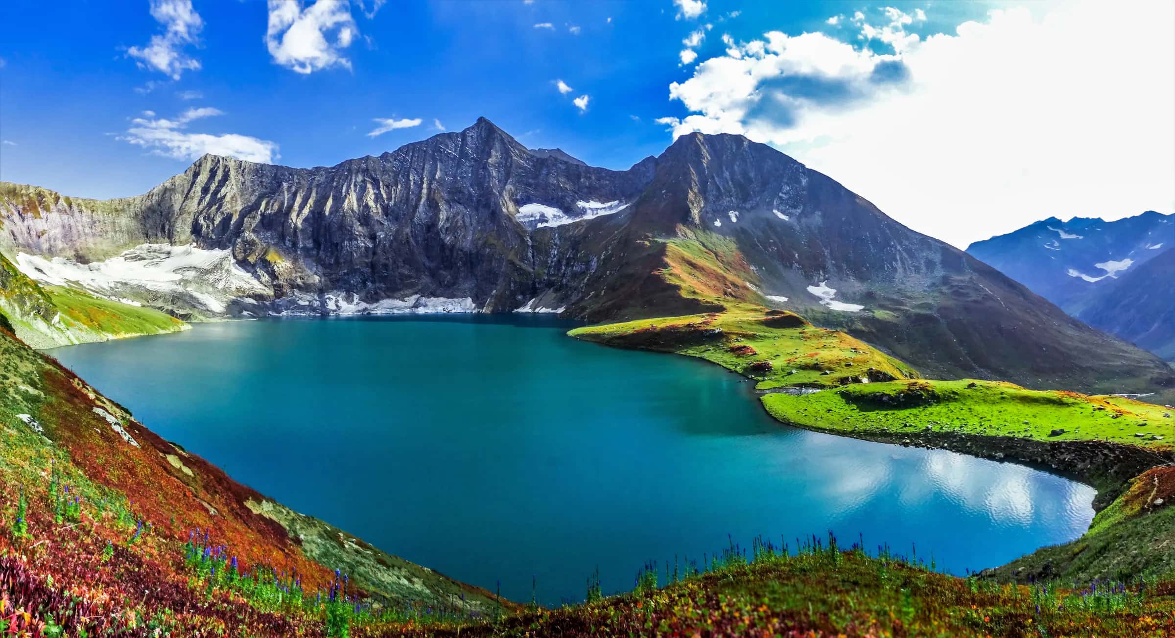 Ratti Gali lake from above, turquoise between the peaks