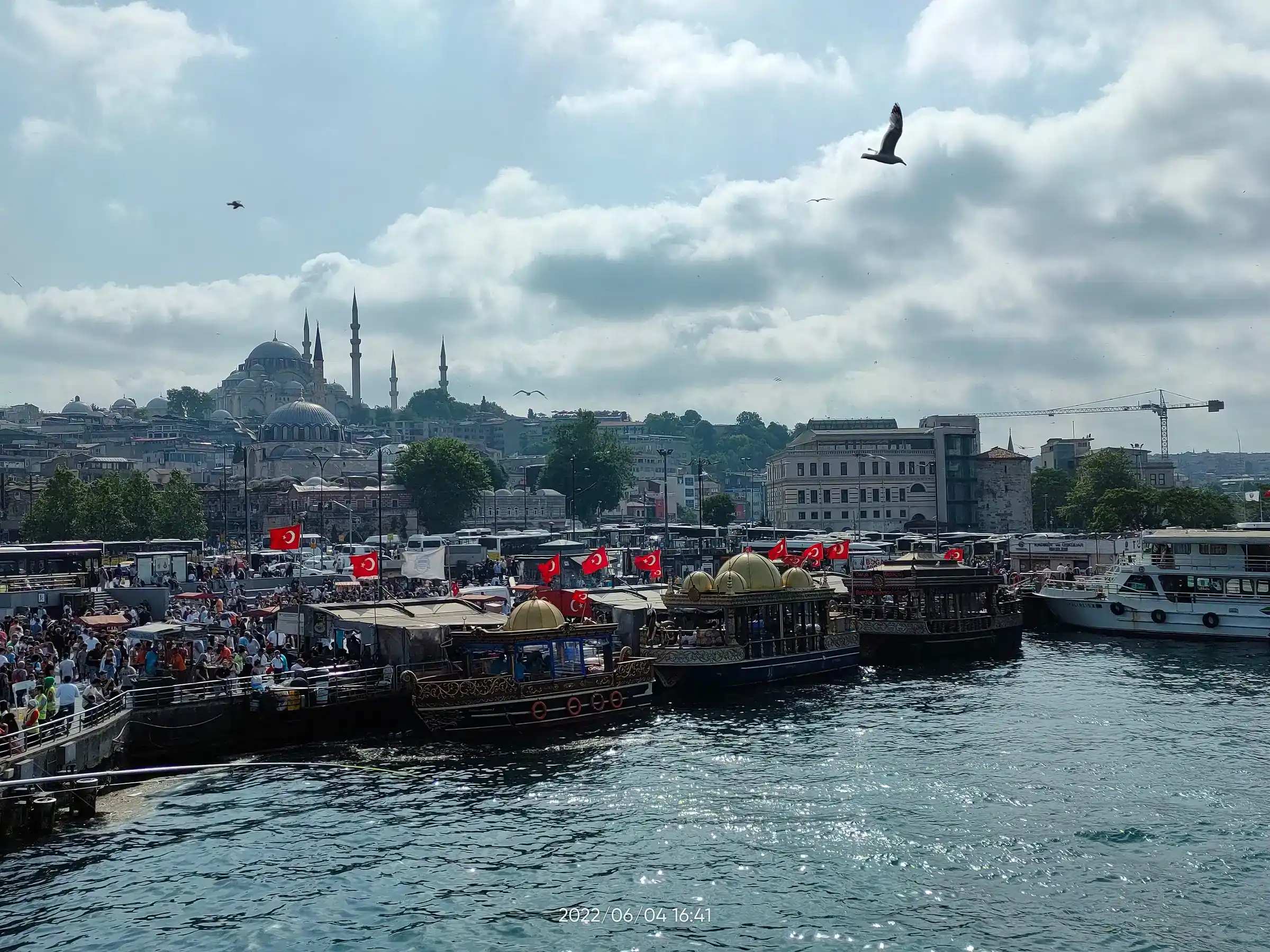 Boats at Eminonu with the Suleymaniye on the hill