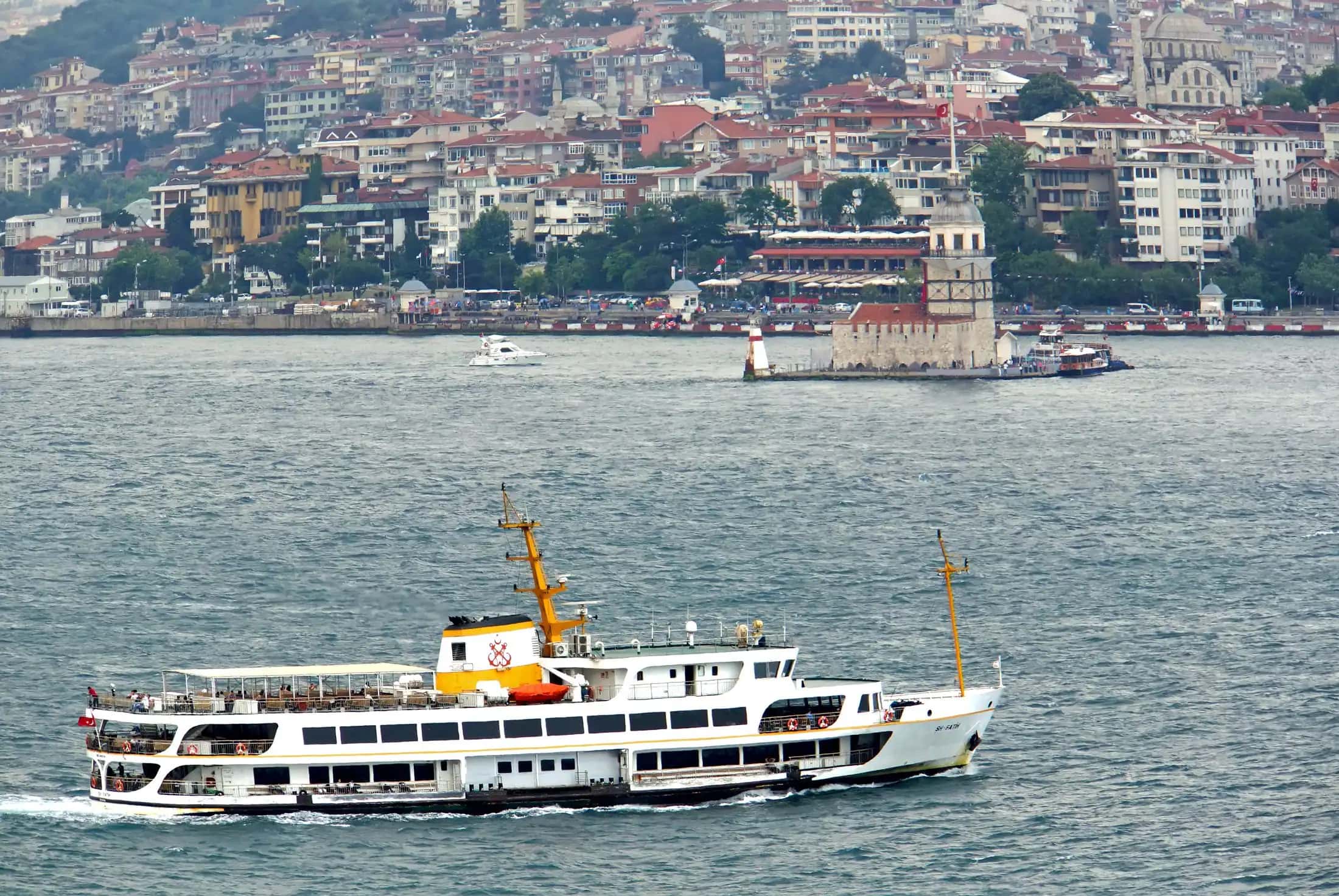 A white ferry crossing the Bosphorus