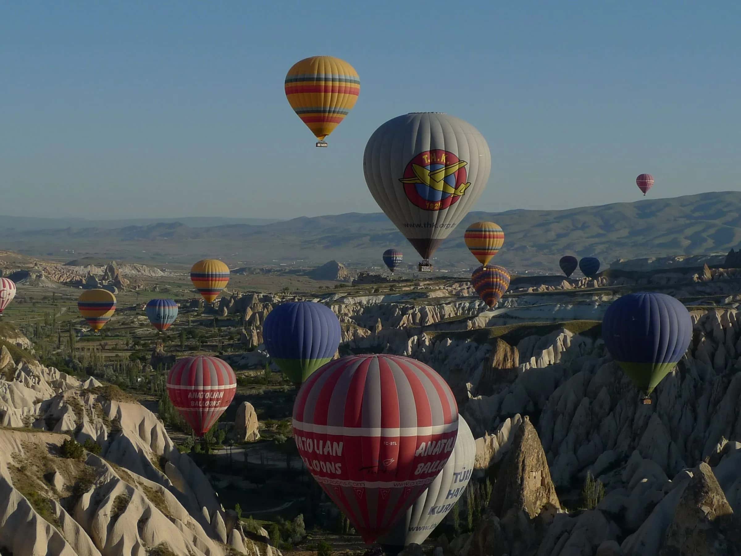 Balloons over the valleys at sunrise