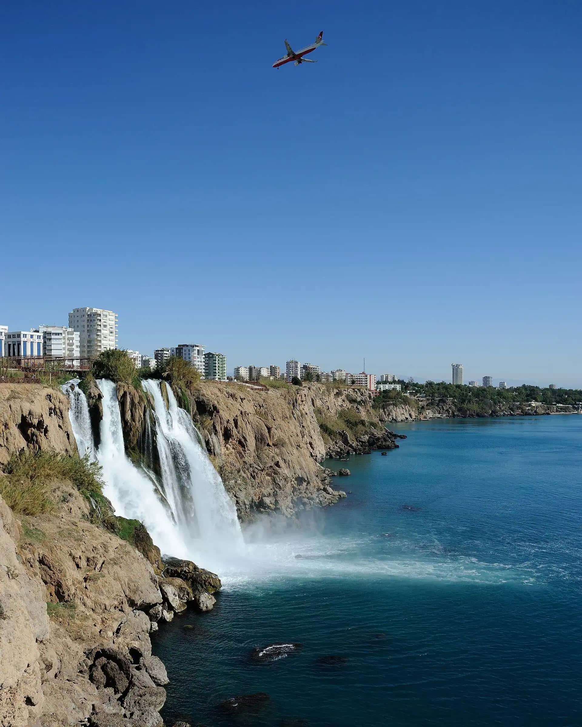 The lower Duden falls pouring off the cliffs into the sea